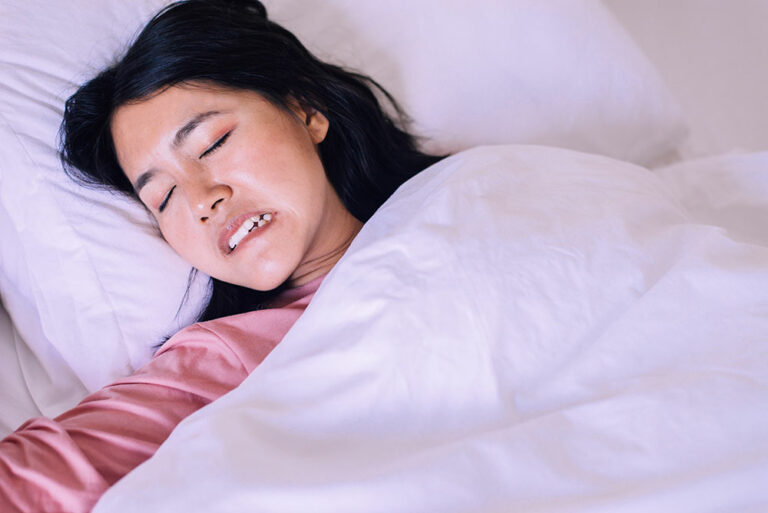 A Lady Grinding Teeth at Night
